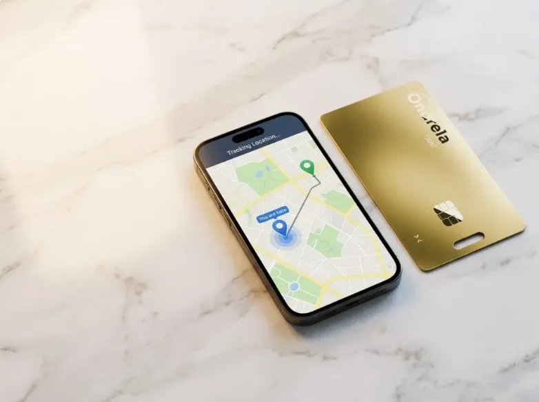 Ondrela card tracker next to a phone showing location tracking